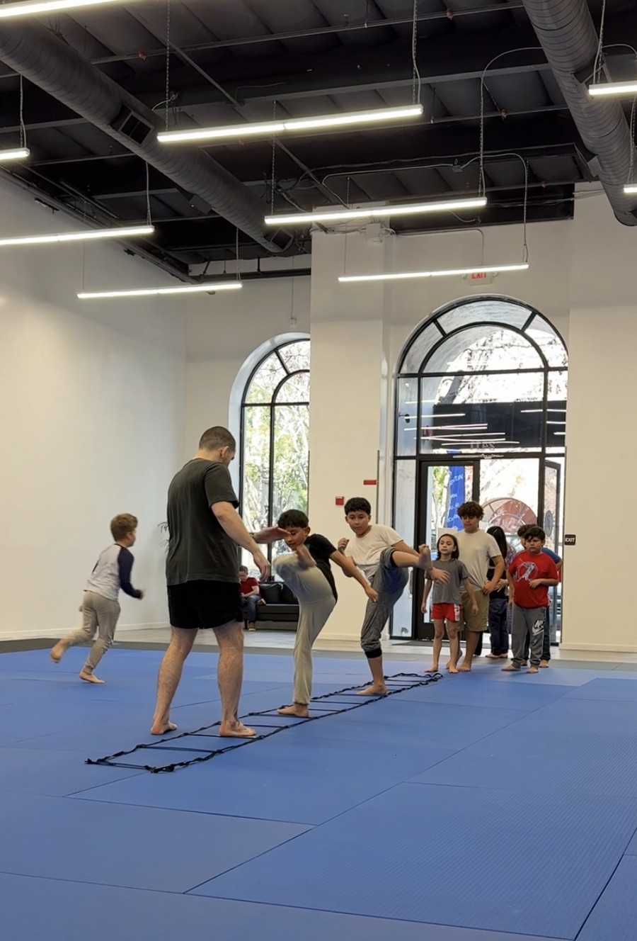Kids on the agility ladder