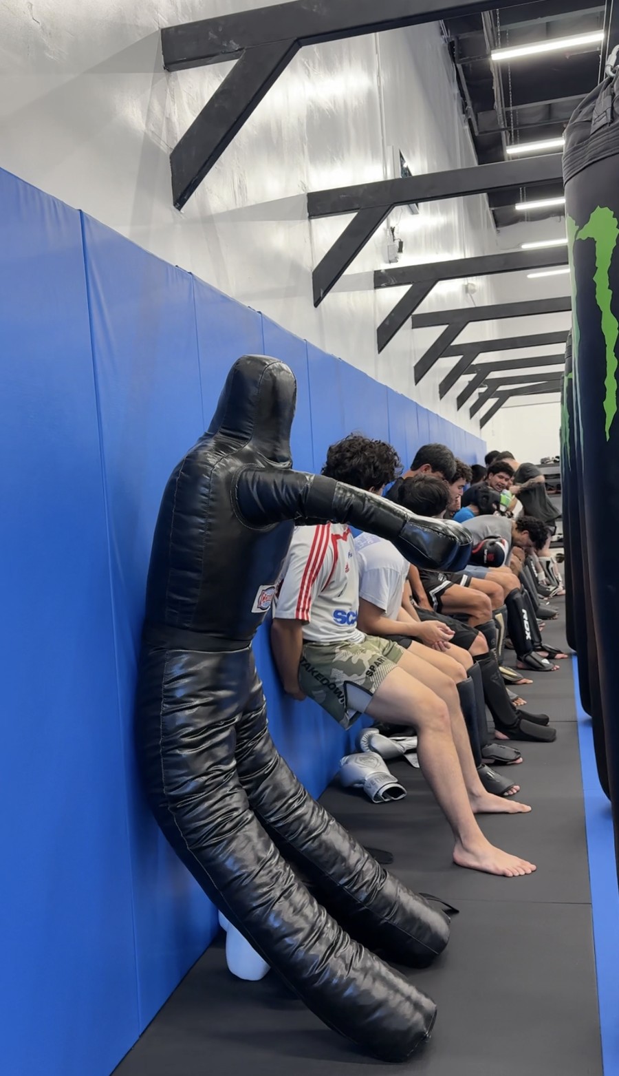 Kids stretching against the wall