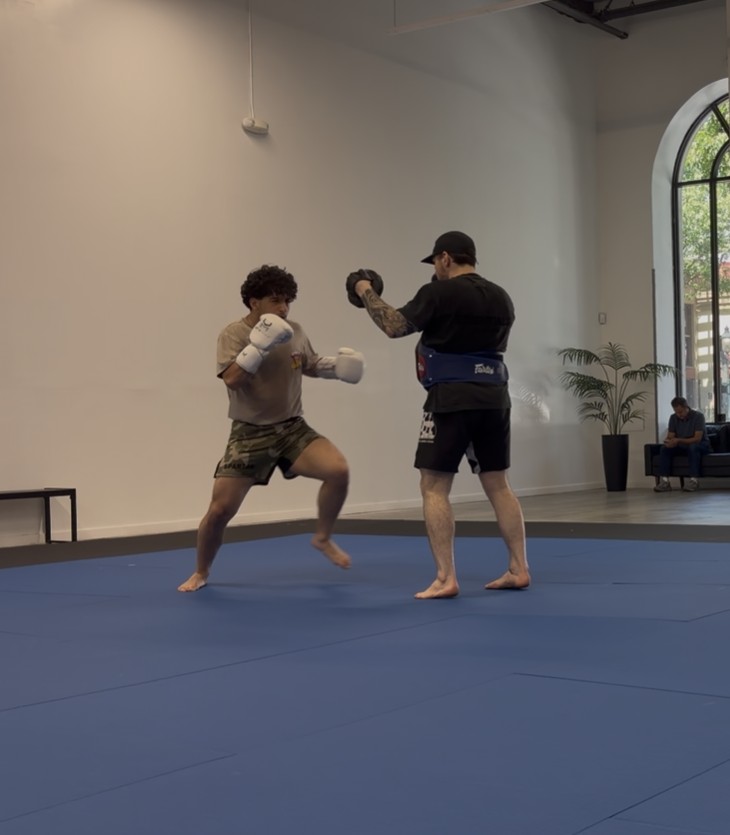 A coach directing sparring