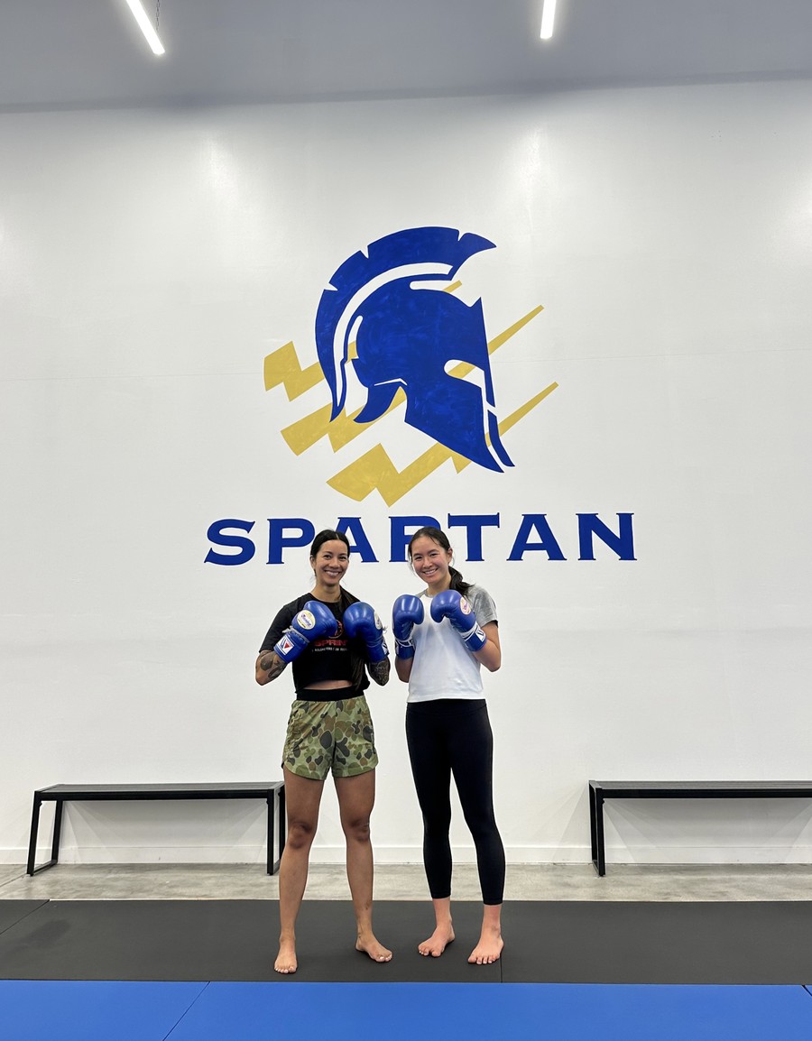 Students in front of the Spartan wall