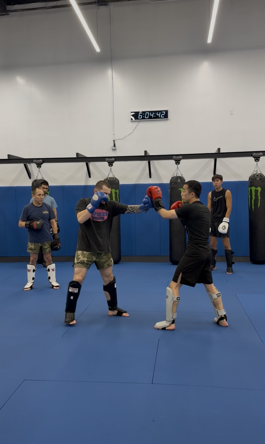 Teens doing pad work
